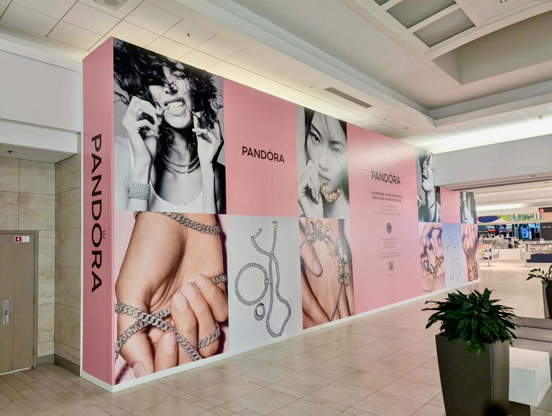 Pandora jewelry hoarding graphics installed on a mall storefront