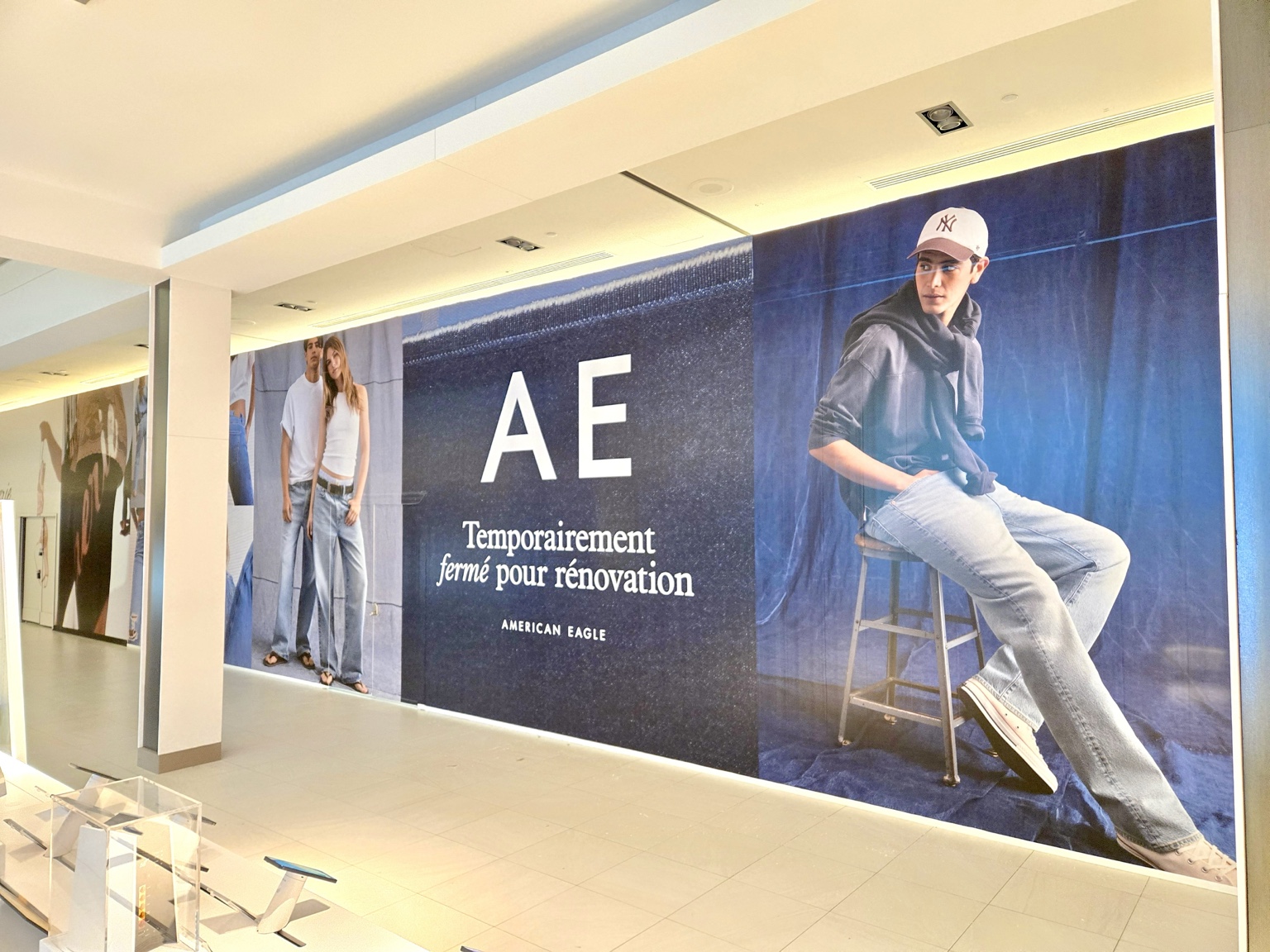 American Eagle hoarding graphic with large fashion imagery