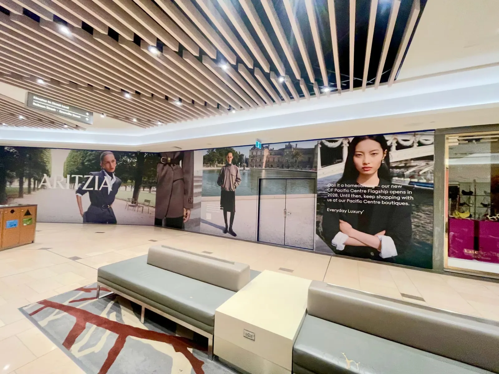 Aritzia hoarding graphics at CF Pacific Centre, Vancouver