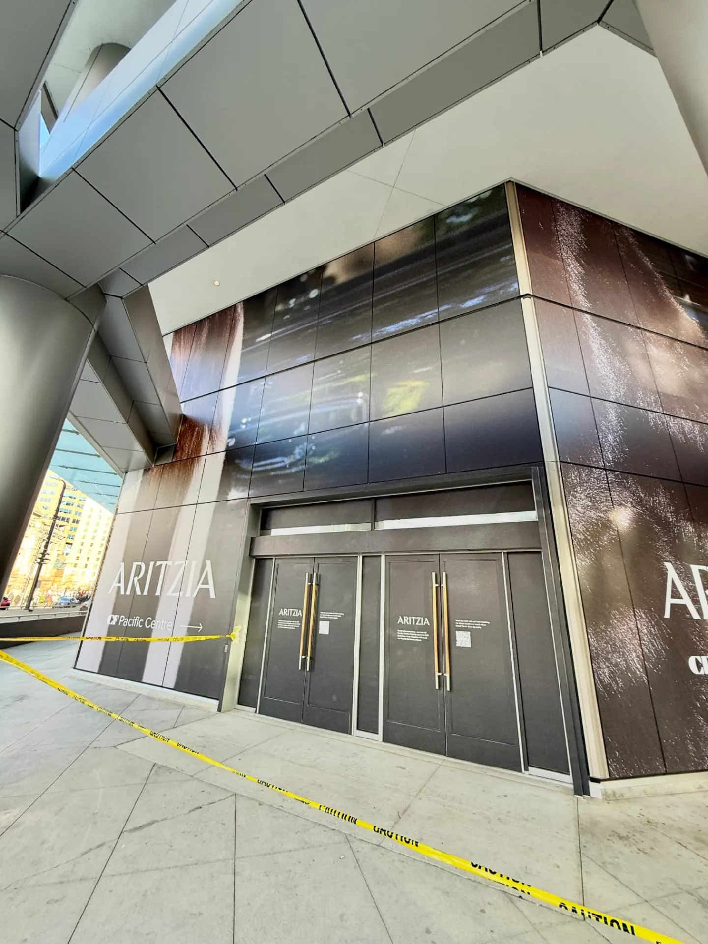 Close-up of Aritzia window graphics panels meeting at a mullion